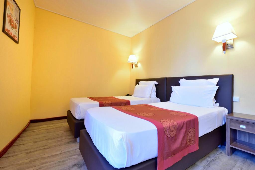 Dvoulůžkový pokoj Superior s oddělenými postelemi a balkonem – Hotel Capitole